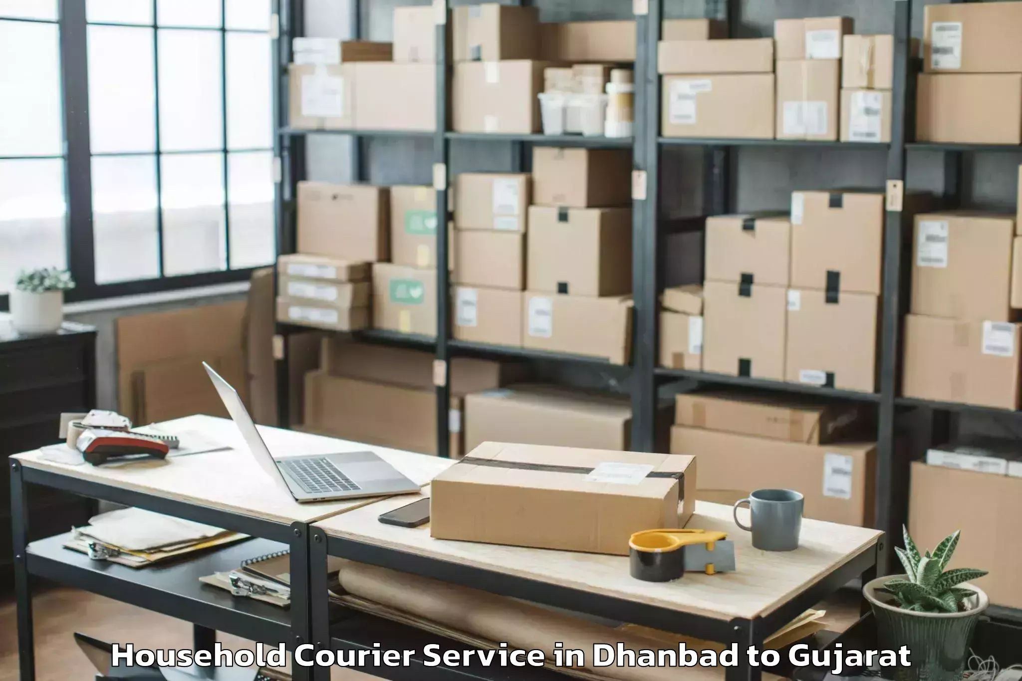 Efficient Dhanbad to Songadh Household Courier